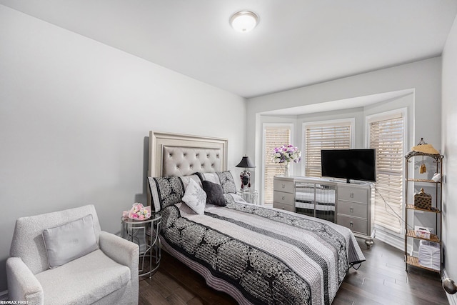 bedroom featuring dark hardwood / wood-style floors