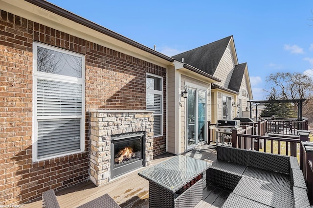 wooden terrace with area for grilling