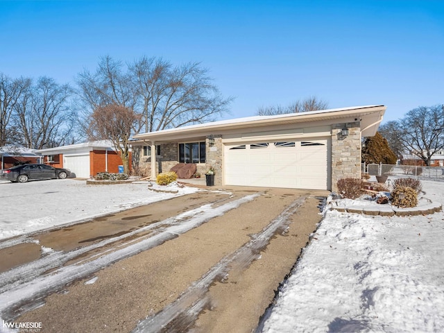 ranch-style home with a garage