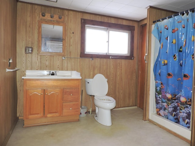 bathroom with vanity, a shower with curtain, toilet, and wood walls