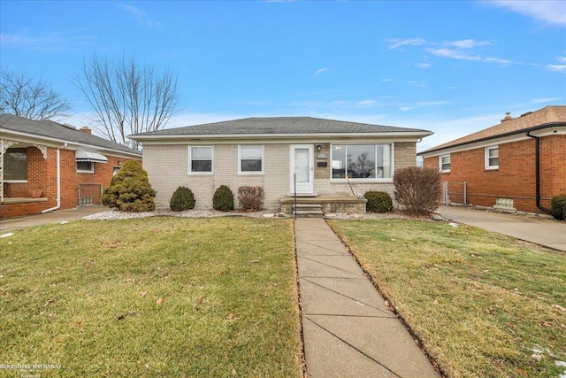 ranch-style home with a front yard