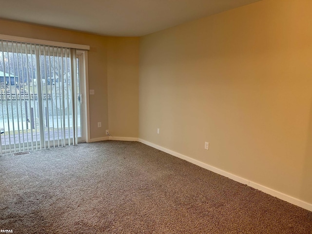 view of carpeted spare room