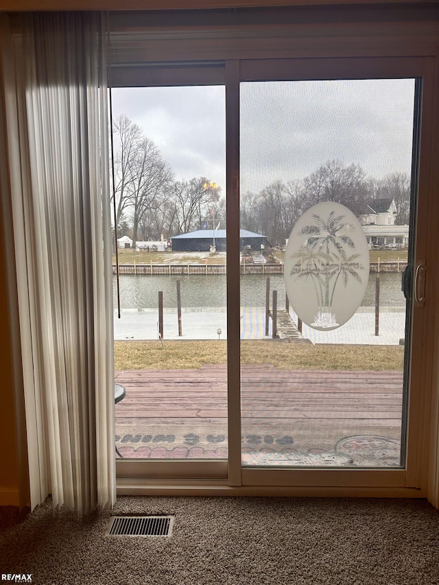 doorway featuring a water view