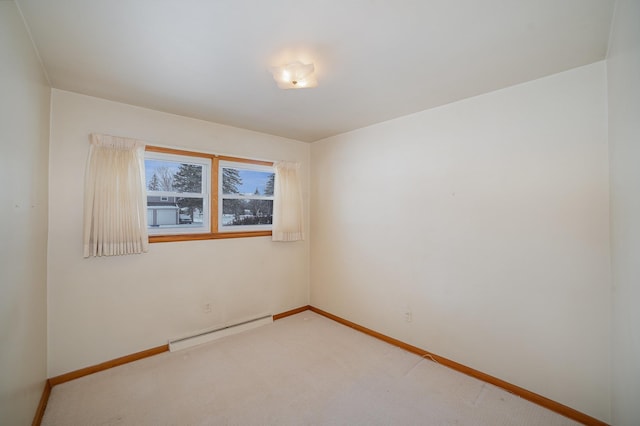 empty room with carpet floors and a baseboard radiator