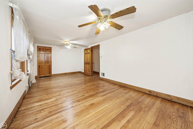 unfurnished room featuring light hardwood / wood-style flooring