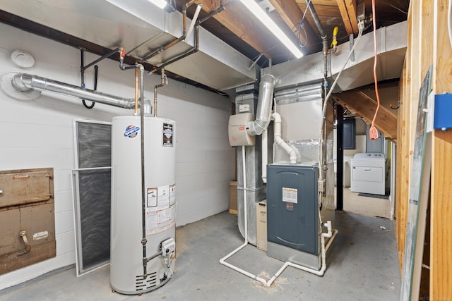 utilities with gas water heater and washer / dryer