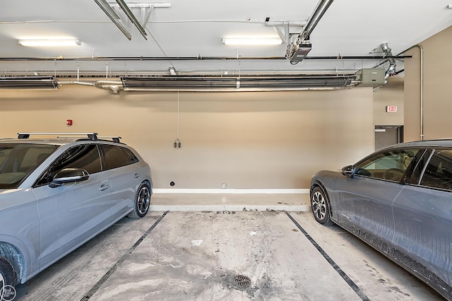 garage featuring a garage door opener