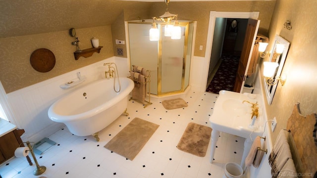 bathroom featuring vanity and separate shower and tub