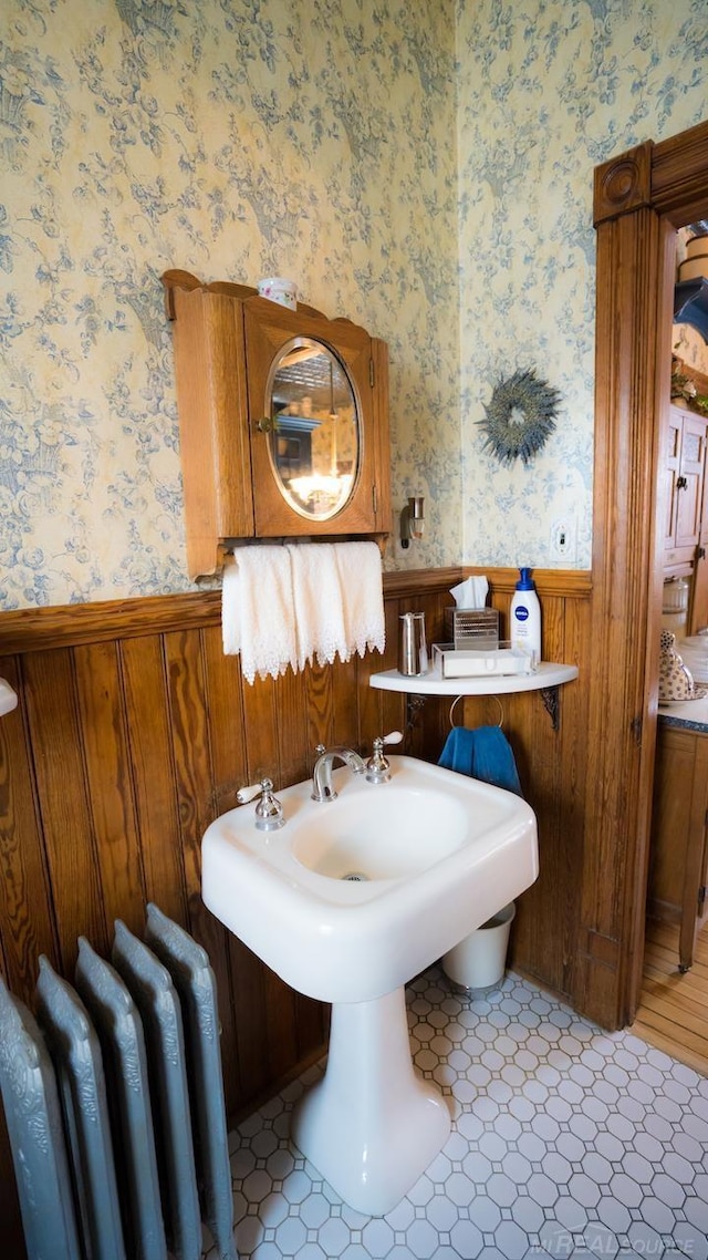 bathroom with radiator heating unit