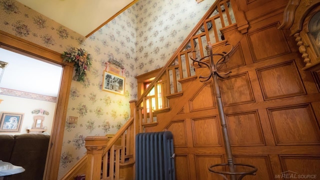 staircase featuring radiator