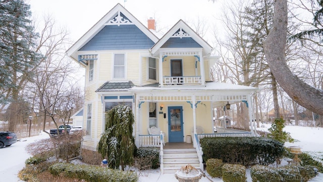 victorian home featuring covered porch