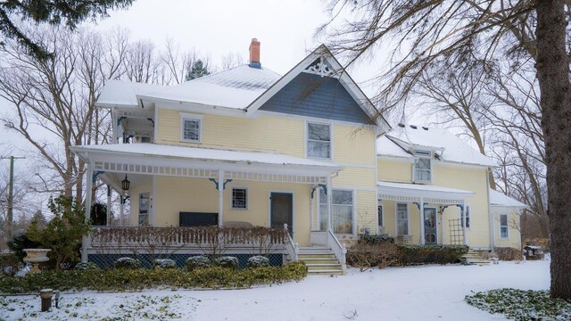 victorian home featuring covered porch