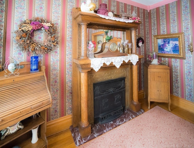 sitting room with hardwood / wood-style flooring