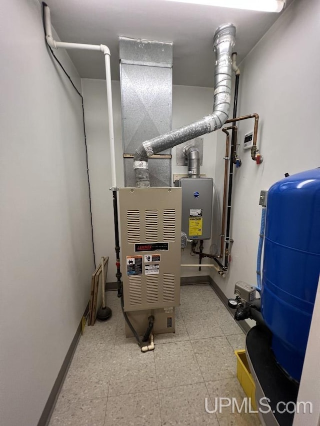 utility room with water heater