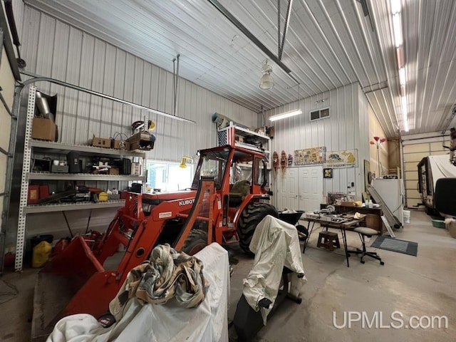 garage with a workshop area