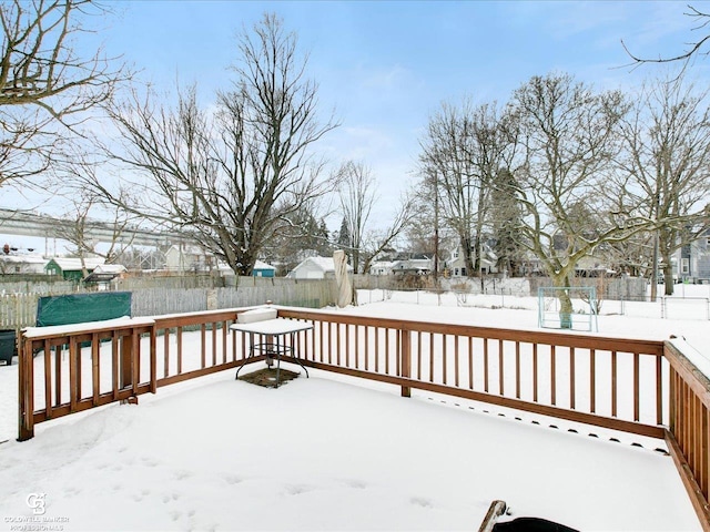 view of snow covered deck