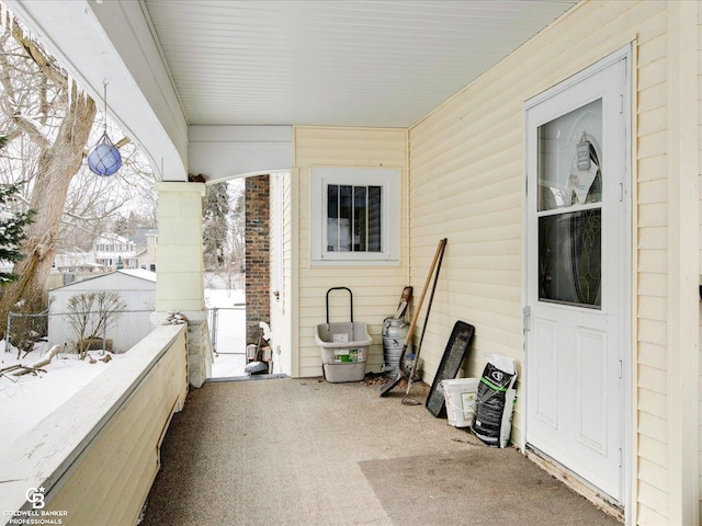 view of snow covered patio