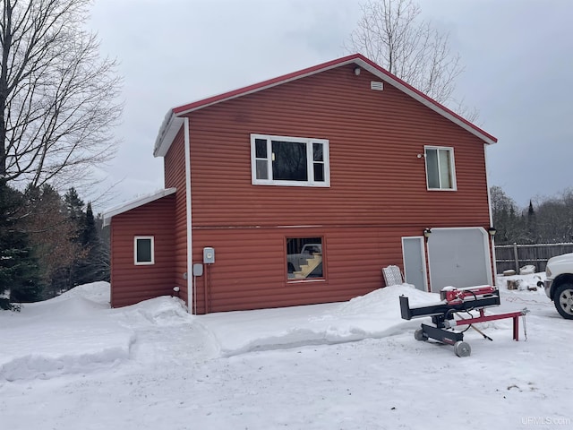 view of snow covered property