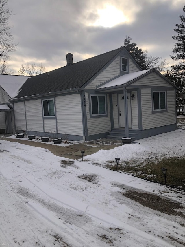 view of front of property with a chimney