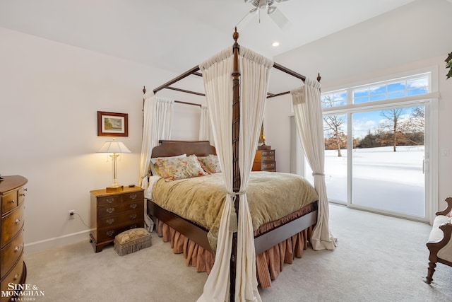 bedroom featuring access to outside and light colored carpet