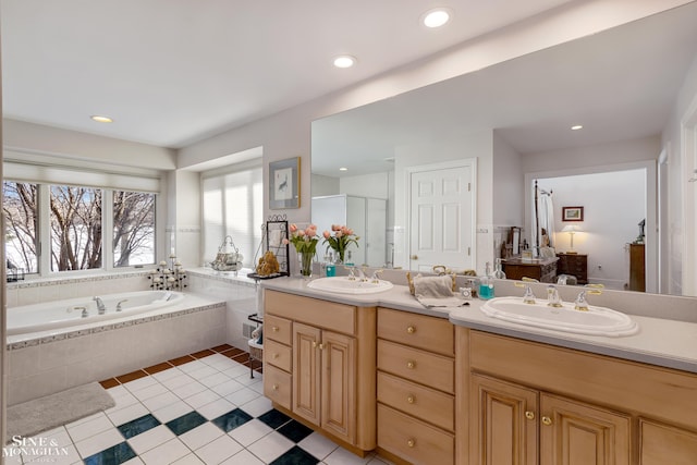 bathroom with vanity, tile patterned flooring, and separate shower and tub