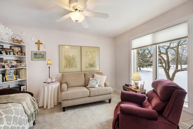 bedroom with light colored carpet and ceiling fan