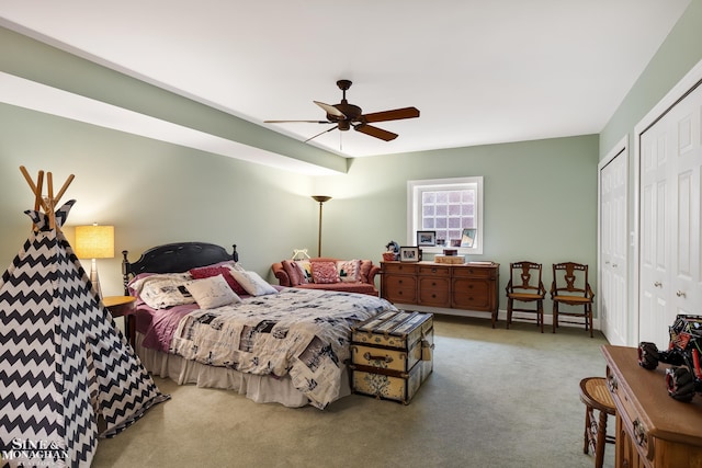 bedroom featuring ceiling fan and carpet flooring