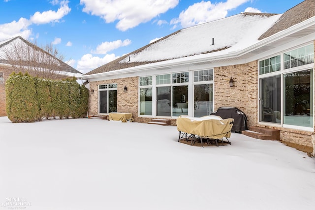 view of snow covered property