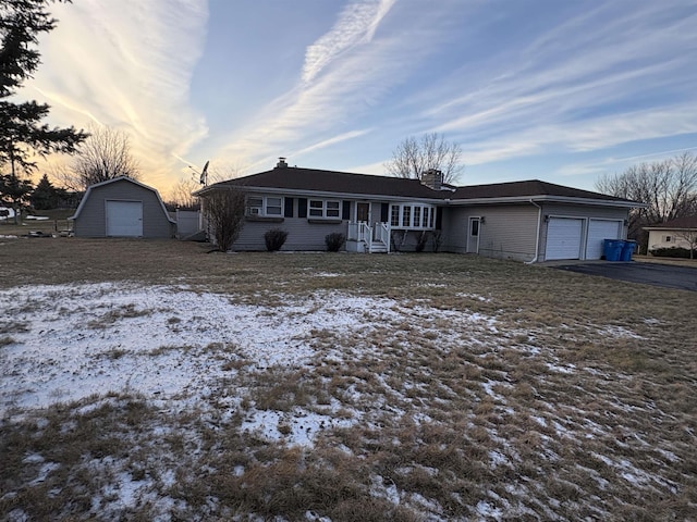 single story home with a garage