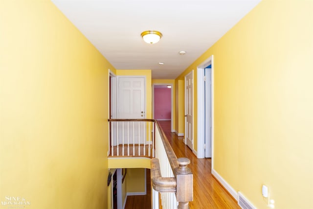 hallway featuring light hardwood / wood-style floors