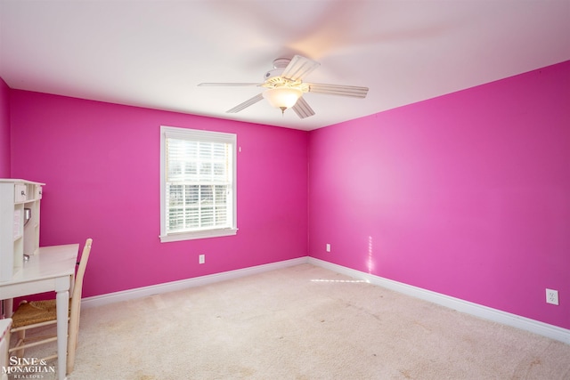 carpeted empty room with ceiling fan