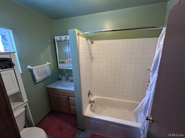 full bathroom with vanity, toilet, and shower / bath combo with shower curtain