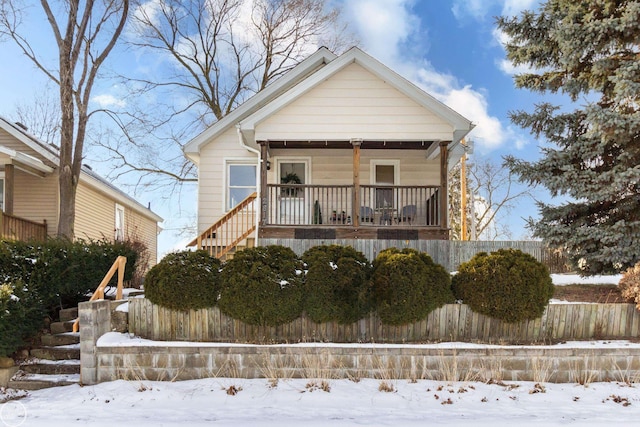 view of front of property featuring covered porch