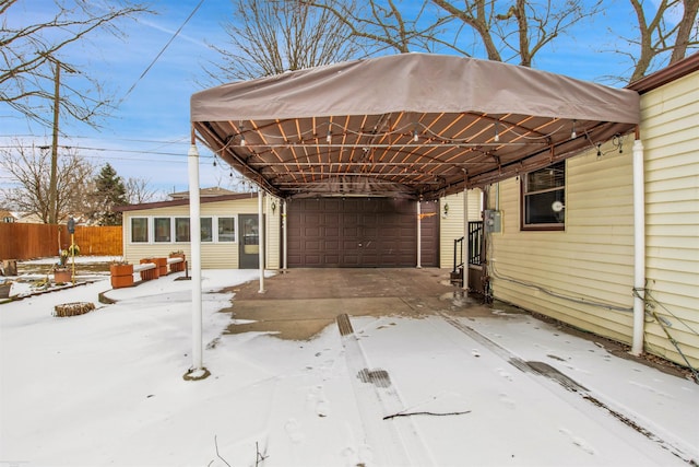 exterior space featuring a garage and a carport