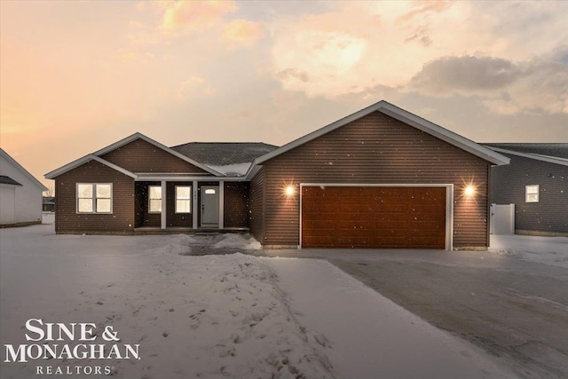 ranch-style home with a garage