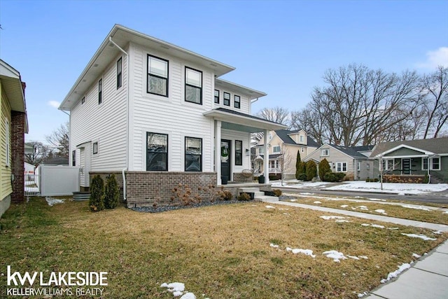 view of front of property with a front lawn