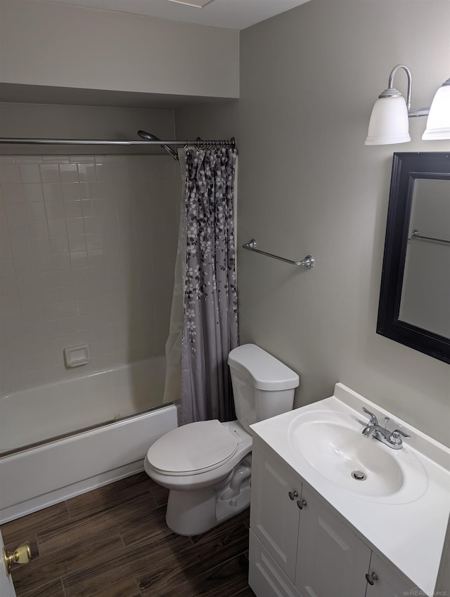 737 Claire Pointe Ct, Saint Clair Shores, MI 48081 - full bathroom featuring hardwood / wood-style flooring, vanity, toilet, and shower / bath combo with shower curtain