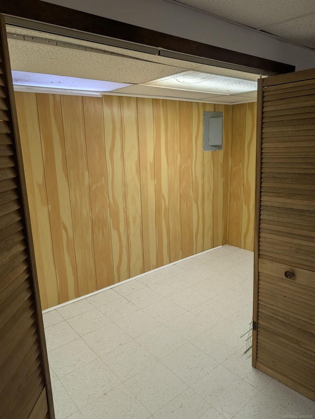 737 Claire Pointe Ct, Saint Clair Shores, MI 48081 - basement featuring a drop ceiling and wood walls
