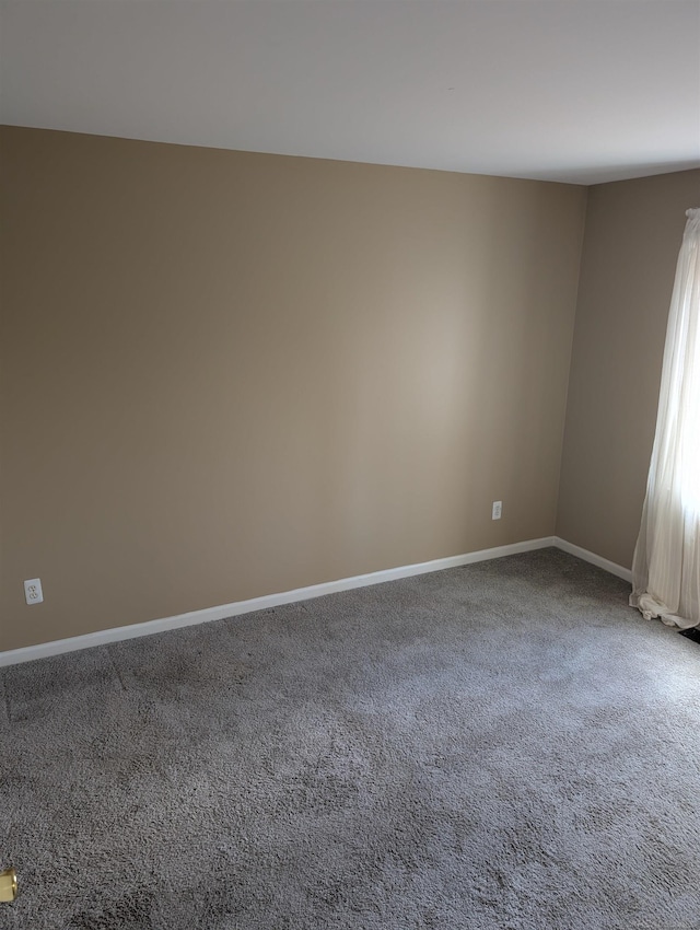 view of carpeted spare room