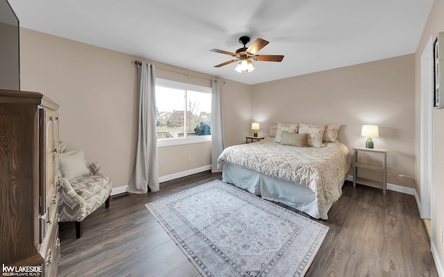 bedroom featuring dark hardwood / wood-style floors and ceiling fan