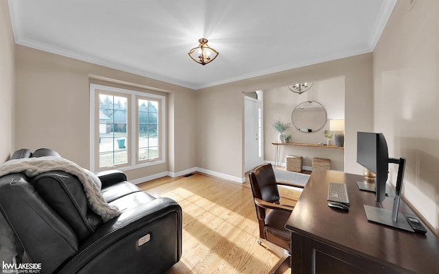 office with crown molding, light hardwood / wood-style flooring, and a notable chandelier