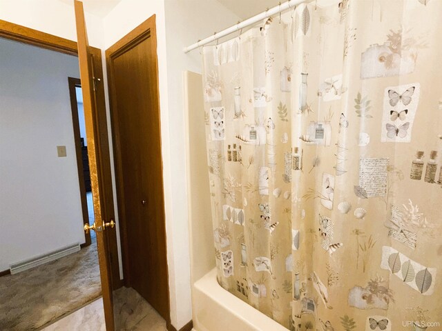 bathroom featuring shower / tub combo