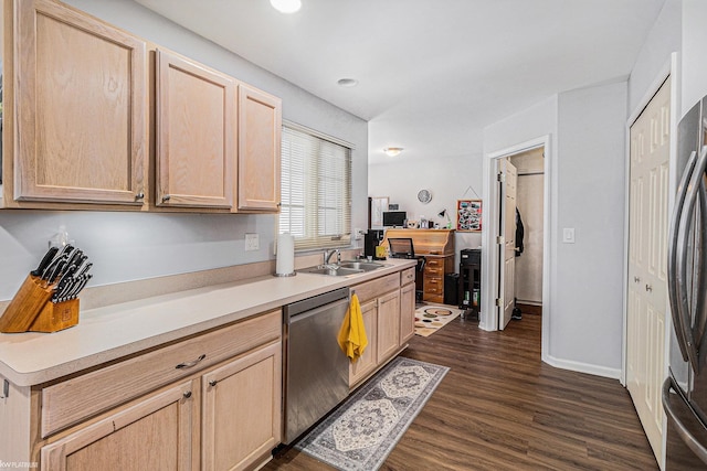 kitchen featuring light brown cabinetry, sink, dark hardwood / wood-style flooring, and appliances with stainless steel finishes