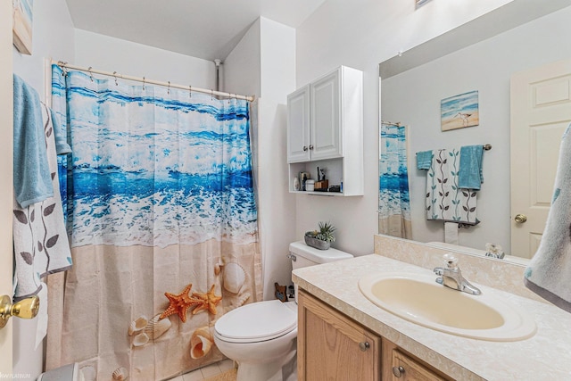 bathroom with tile patterned flooring, vanity, walk in shower, and toilet