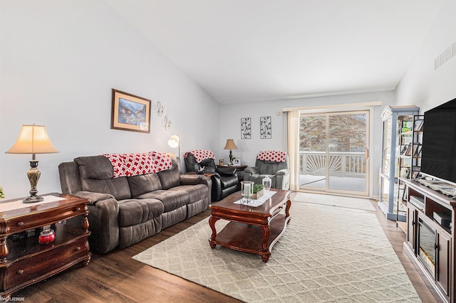 living room featuring dark wood-type flooring