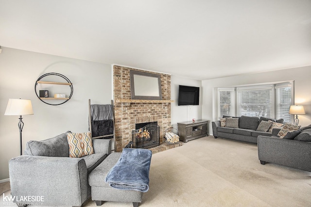 living room with carpet flooring and a brick fireplace