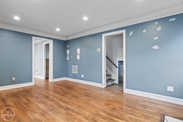 unfurnished room featuring light hardwood / wood-style flooring