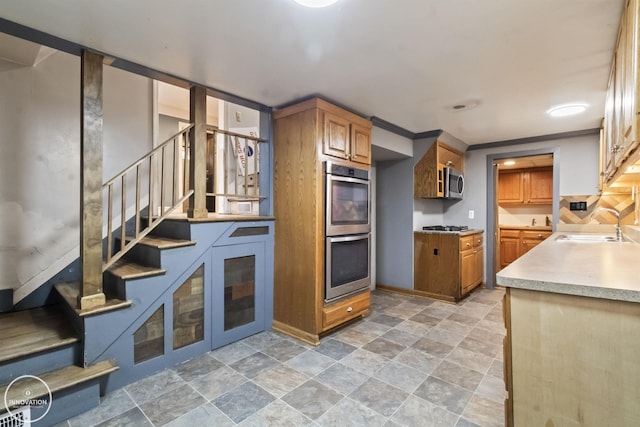 kitchen featuring appliances with stainless steel finishes and sink