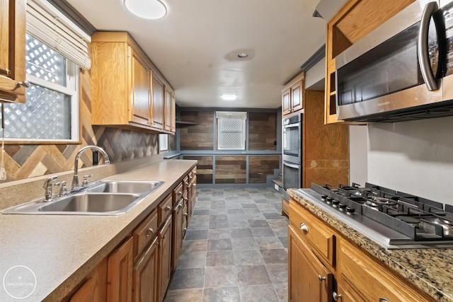 kitchen featuring stainless steel appliances and sink