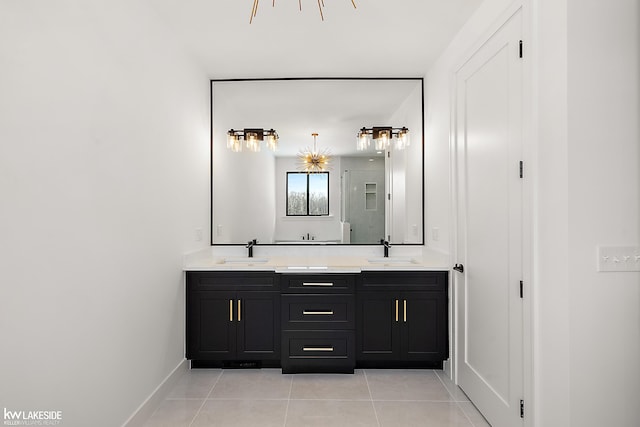 bathroom with vanity and tile patterned flooring